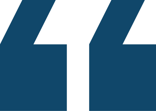 Large blue quote symbol graphic