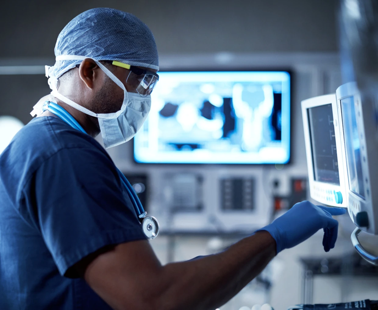 Medical professional working in high-tech environment.